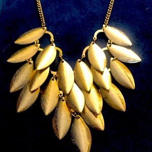 Necklace - gold colored ‘leaves’. 15” chain with extender. Very light weight.